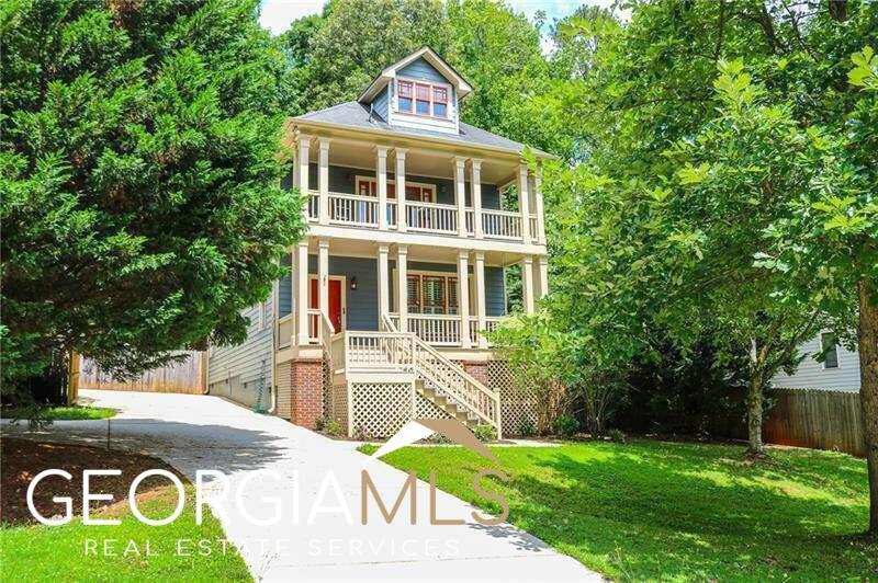 Check out the 3D virtual tour! This 3 bed 2.5 bath Charleston style home offers a warm and inviting atmosphere with its charming front porch and porch swing, ideal for enjoying your morning coffee or unwinding in the evenings. As you step inside, youCOll find a spacious living room, with gleaming hardwood floors, a fireplace, and plantation shutters, creating a cozy and elegant ambiance. The separate dining room provides a designated space for meals and gatherings. The kitchen is equipped with stainless steel appliances, granite countertops, a pantry, and an eat-in dining area. It also provides convenient access to the amazing deck & yard, perfect for outdoor entertaining. The covered deck sitting area extends the living space outdoors, allowing you to enjoy the beautiful back yard, which features an oversized deck, a generous stone patio area, and an upper level firepit area. The meticulously landscaped yard adds to the overall appeal and creates a delightful outdoor experience. On the upper level youCOll find the primary suite, complete with 2 walk-in closets, a full bathroom, and a private upper-level deck. Additionally, there are two more bedrooms, a full bathroom, and laundry room, offering practicality and convenience. The home also includes a 2-car parking pad and a turnaround area. Its location is convenient, with easy access to Avondale Estates, downtown Decatur, various retail and restaurant options, as well as major roads I-20, I-285. All appliances remain including the washer & dryer.