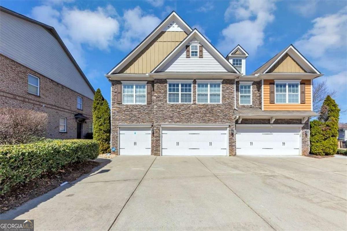 Discover the perfect blend of comfort, style, and convenience at this stunning end-unit townhome in the gated community of Creekside Manor! From the moment you step inside, the natural light, soaring ceilings, and open floor plan invite you to relax and feel right at home. Beautiful LVP flooring, oversized windows, and thoughtfully designed living spaces create an atmosphere that's both modern and warm. Enjoy morning coffee in the quiet, landscaped surroundings or unwind by the sparkling community pool just steps away. With 2 spacious bedrooms, walk-in closets, a private garage with driveway, and easy access to I-85, 285, shopping, dining, and more - this home truly has it all. Whether you're a first-time buyer, downsizing, or simply ready for low-maintenance living in a peaceful neighborhood. This is the one you've been waiting for! Come experience the lifestyle - before someone else does!