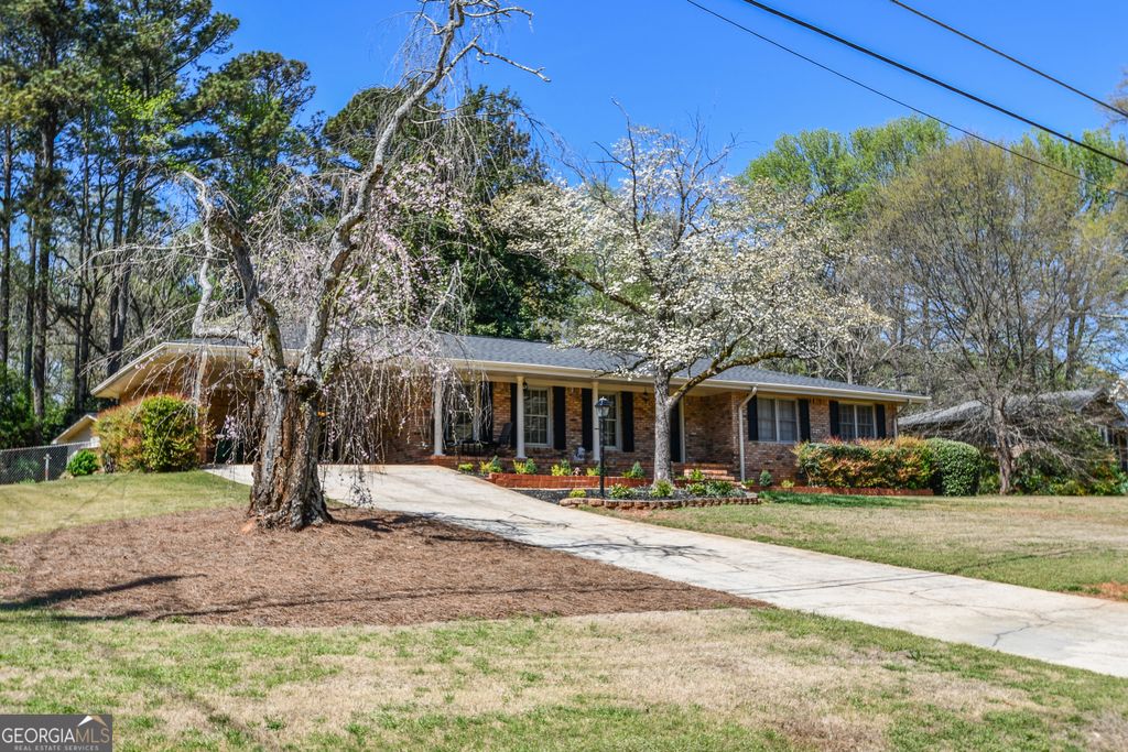 Photo of 1325 Maple Drive SW, Lilburn, GA 30047 (MLS # 10720213)