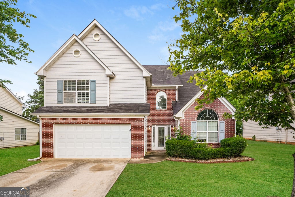 Photo of 1009 Lear Drive, Locust Grove, GA 30248 (MLS # 10874631)