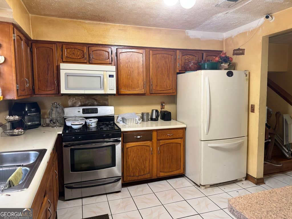 Photo of 9519 Forest Knoll Drive, Jonesboro, GA 30238 (MLS # 10824777)