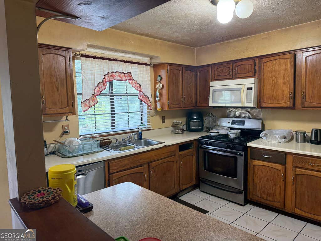 Photo of 9519 Forest Knoll Drive, Jonesboro, GA 30238 (MLS # 10824777)