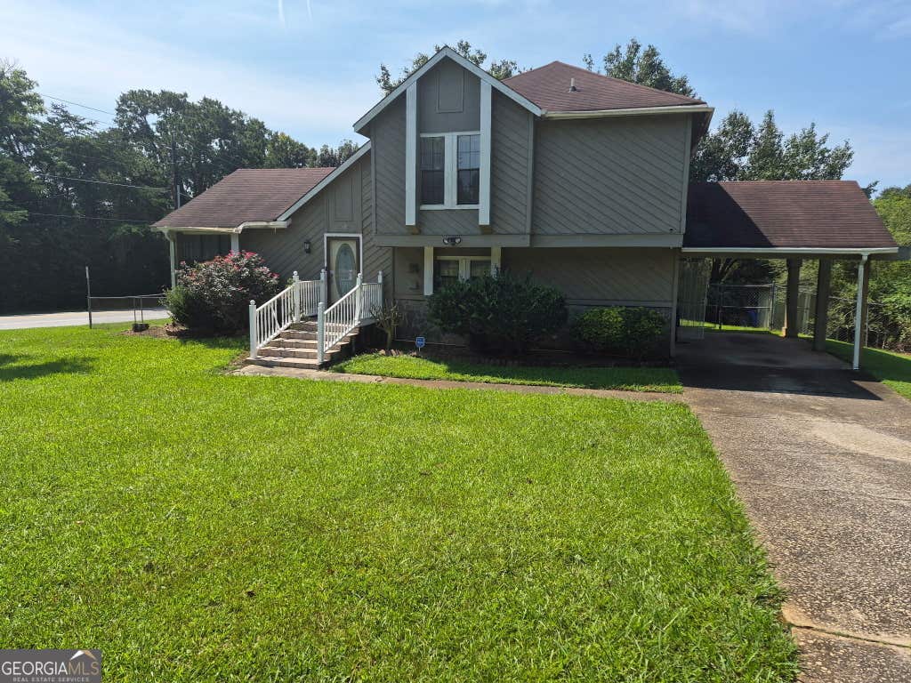 Photo of 9519 Forest Knoll Drive, Jonesboro, GA 30238 (MLS # 10824777)