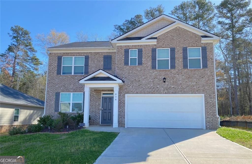 Photo of 676 Whitman Lane, Stockbridge, GA 30281 (MLS # 10713122)
