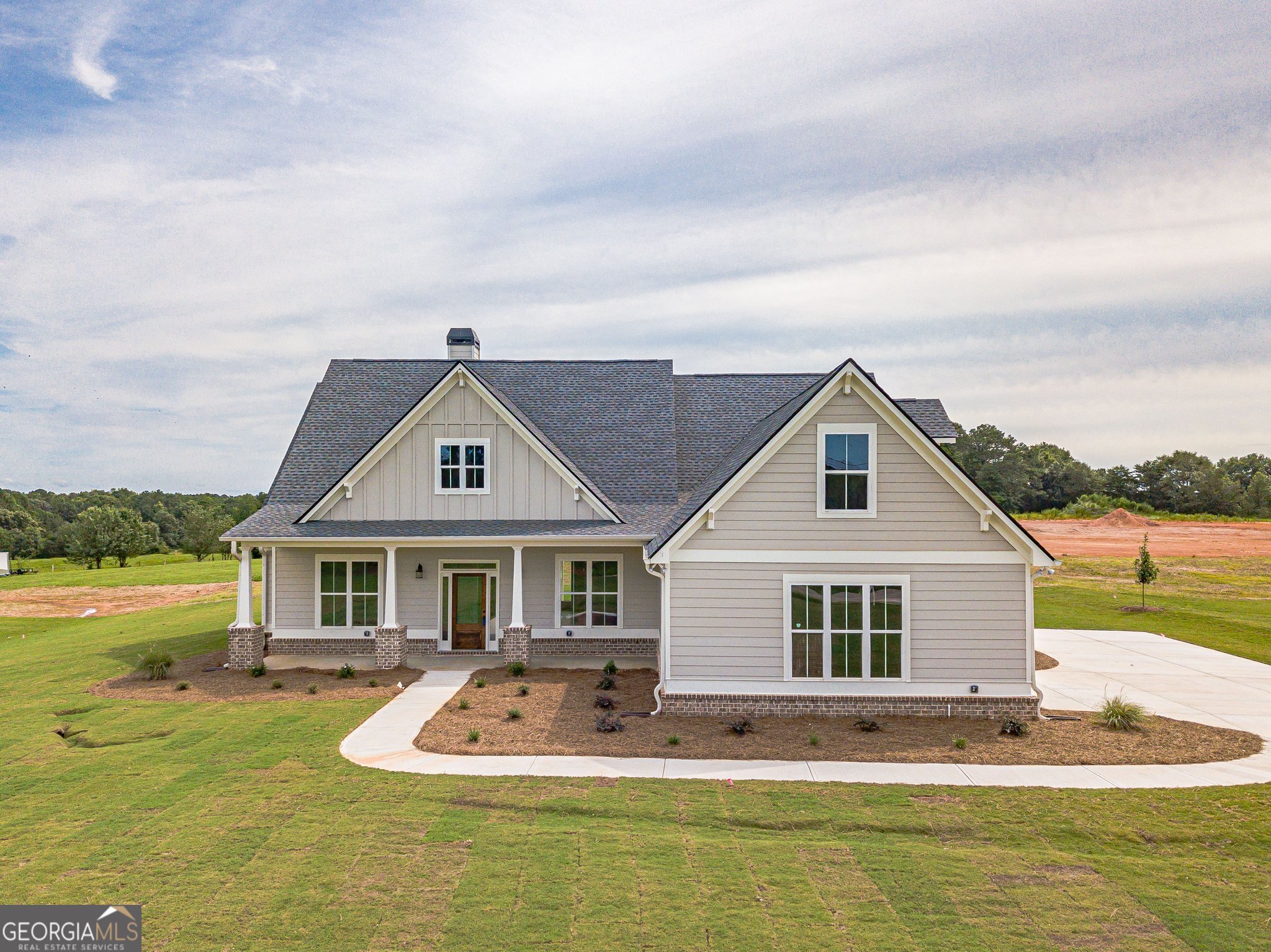 Ask us How To get your First Year Interest Rate at 4.9% or Below. NEW Construction 5 Bedroom 4 Bath Ranch Home on 4.4+ Beautiful Acres in Sought After Walnut Grove Schools or Social Circle Schools. This modern farmhouse plan is a split bedroom plan with the master suite on one side and 3 other bedrooms on the other. The 5th bedroom is above the garage with a full bath. You will fall in love with the views & the open floor plan. The great room opens to the kitchen & breakfast room. The kitchen features stone counters, stainless appliances, a large island, & a pantry. Beautiful details & finishes throughout. Master suite has a walk-in shower, dual vanity, walk-in closet, & more. 4.4+ beautiful acres for your enjoyment. Come make this your next home!