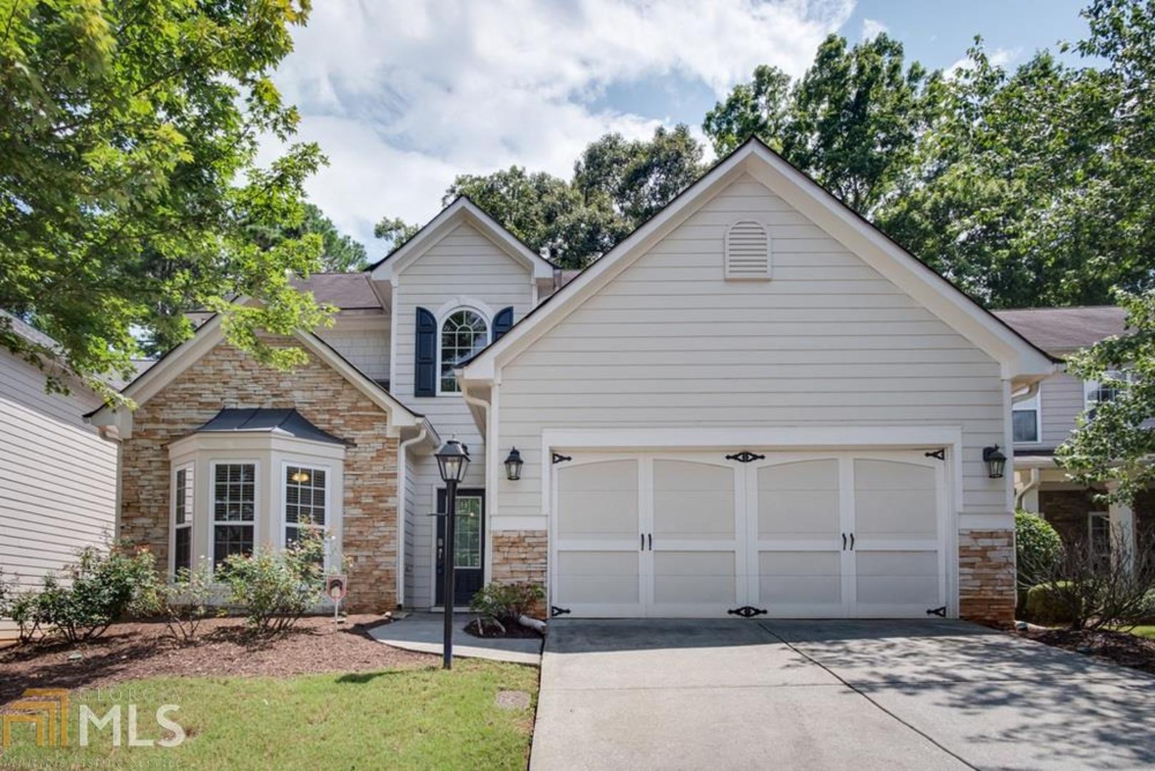 Beautiful 4 bedroom, 3 bathroom home located in Cumming. Master bedroom is on main floor. Hardwood floors throughout the entire house, open floor plan. Stainless steel gas cooktop and hood in the kitchen along with stained cabinets. Stack stone fireplace. Great school district! Near shopping centers and restaurants.