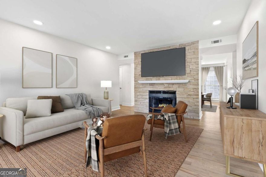 Just minutes from Marietta Square, this beautifully renovated 2-bedroom, 2-bath condo offers comfort, style, and convenience in a gated community with a pool and dedicated parking. Featuring brand-new luxury vinyl plank flooring, fresh paint, granite countertops, white shaker-style cabinets, and all-new appliances, the home combines modern upgrades with thoughtful design. The split roommate floor plan ensures privacy, with each spacious bedroom offering its own bathroom and walk-in closet, while the cozy living room with fireplace flows into a dedicated dining area and bright sunroom filled with natural light. Situated on the second floor with no neighbors above, this move-in ready condo provides peace and quiet while still being close to shopping, dining, and parks. Don't miss your chance to own this updated home in a prime Marietta location-schedule your showing today!