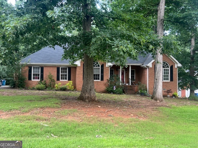What a great home located in a wonderful location of Athens, Ga. This 3 bedroom 2 bath contemporary style home is all on one level. It has a split bedroom design with a welcoming foyer entrance. The garage has been enclosed to allow for an extra bonus room and has a lots of room. The kitchen has an eat in area and also a bar for seating. There are granite countertops and stainless appliances. The HVAC system and roof are less than 5 years old. Water heater is fairly new and in great condition as well. Outside you have a nice back deck overlooking a private fenced in back yard that has been beautifully landscaped. There is also a nice storage building out back. There is a stand up crawl space under the home that has been well attended including a dehumidifier for keeping it nice and dry. This is a nice home with a great price of 349,000
