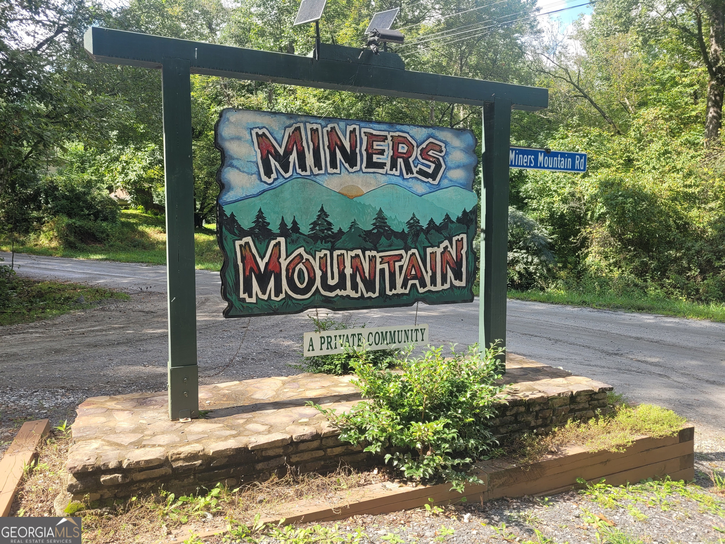 This 2.22-acre residential lot is located in the highly desirable area of Sautee Nacoochee within the Miners Mountain subdivision. Imagine building your dream home or a cozy retreat on this property, which offers stunning mountain views and plenty of privacy. The lot features a mix of sloped and level terrain, with spots perfect for construction to maximize both views and seclusion. Miners Mountain is conveniently situated just north of Unicoi State Park, close to attractions like Anna Ruby Falls, hiking trails, kayaking, and the charming Bavarian-style town of Helen, known for its restaurants, shopping, tubing, and more. The seller has even provided a copy of the house plans they intended to use, which you can check out in the attached photos.
