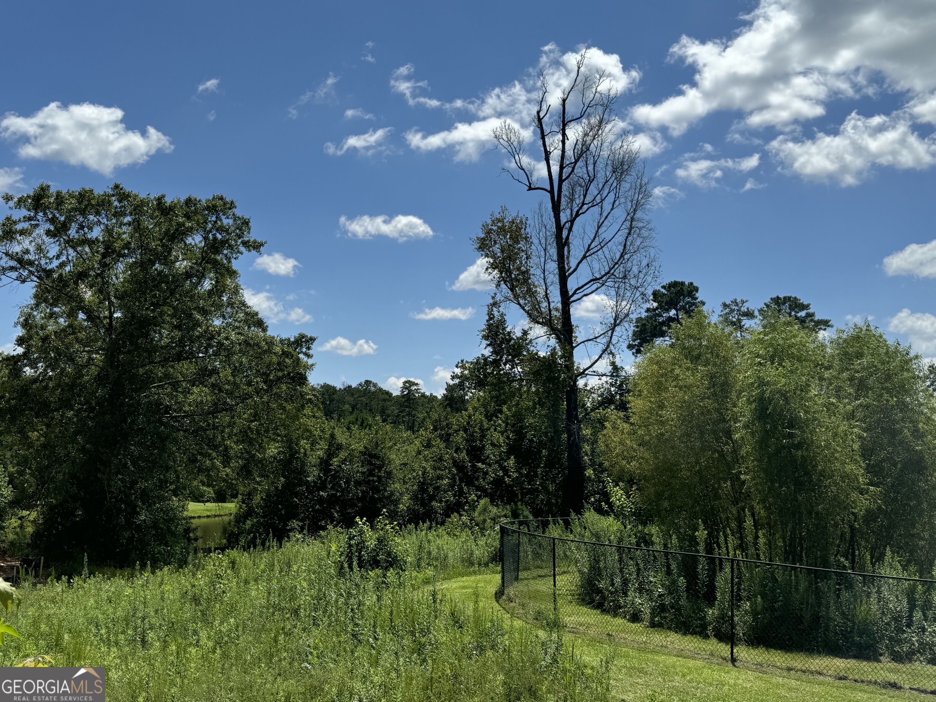Tucked away in Barrington Hall is this beautiful lot just waiting for you to build your dream home! In a cul-de-sac so there's no through-traffic. Best of all this lot is situated on a small pond on the golf course! Included is a peninsula that juts out into the pond--imagine the possibilities! Call/text Becky at 478-231-5596 to secure this lot today!
