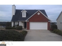 SPACIOUS CORNER LOT HOME IN ESTABLISHED SWIM TENNIS COMMUNITY. MINUTES FROM SHOPPING, ENTERTAINMENT AND MAJOR HIGHWAY ACCESS