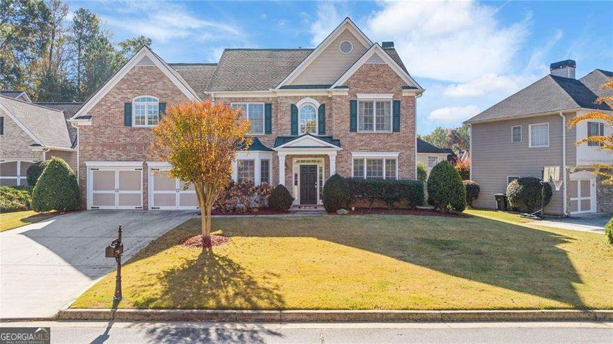 This is the kind of home that makes you pause mid-scroll-bold, bright, and built for real life in one of West Cobb's most connected communities. Nestled in a vibrant swim and tennis neighborhood known for its community events, fishing lake, and scenic walking trails, this 5-bedroom, 3.5-bath brick beauty blends timeless charm with thoughtful design. A light-filled two-story foyer opens to flexible spaces ideal for a home office or sitting room, and the open-concept layout leads into a spacious living room with 10-foot ceilings, a fireplace flanked by built-ins, and floor-to-ceiling windows that flood the home with natural light. The kitchen is a showstopper with deep basil-colored cabinetry (a rich sage hue), solid brass hardware, stylish backsplash, a large island, stainless steel appliances-including a newer refrigerator and dishwasher-and a walk-in pantry. Step out onto the oversized screened porch, perfect for morning coffee or weekend BBQs, overlooking a level, fenced backyard with a charming playhouse ready for adventure. Upstairs, the oversized primary suite offers a spa-style bath and huge walk-in closet, while four additional bedrooms provide room for kids, guests, or a second office. And for those embracing modern living, the home is equipped with a Level 2 EV charger featuring NACS ports-ready for your Tesla or other compatible vehicle. When you're ready to explore, Marietta Square is just 8 minutes away with boutique shopping and upscale dining, Kennesaw Mountain's trails are only 5 minutes out, and you're within easy reach of grocery stores, Target, and Home Depot. This is the total package in one unforgettable address.