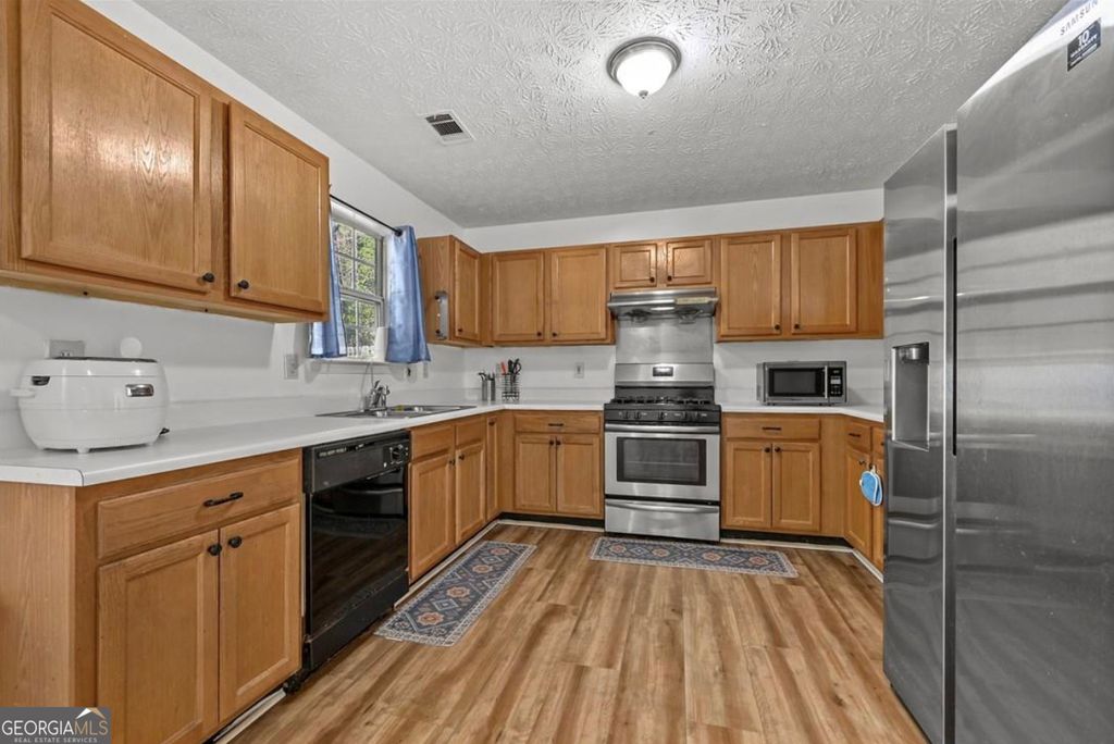 Photo of 4005 Jackson Shoals Court, Lawrenceville, GA 30044 (MLS # 10759043)