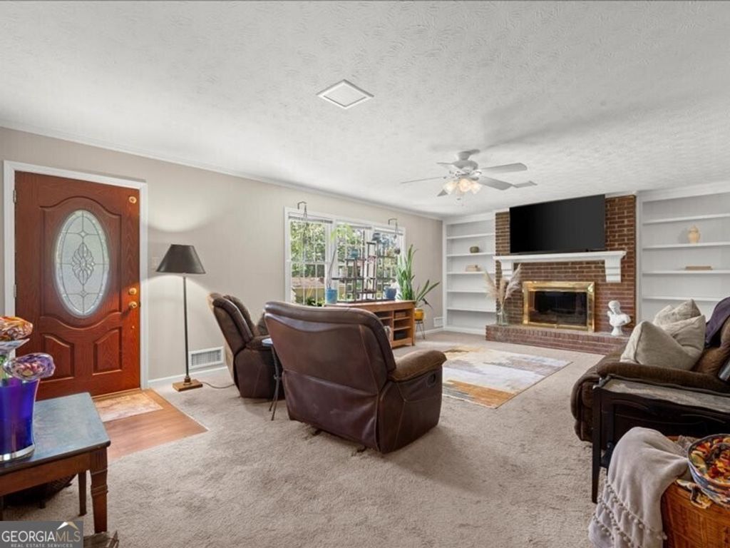 Photo of 2117 Hartridge Drive, Snellville, GA 30078 (MLS # 10766737)