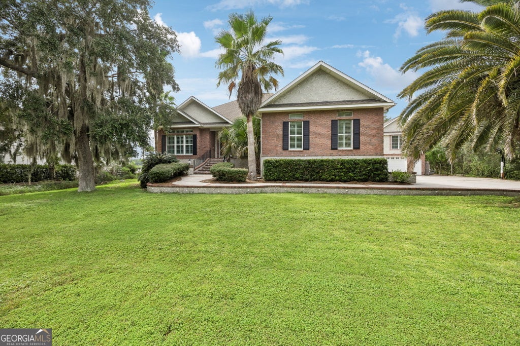 Photo of 915 Riverview Drive E, Saint Marys, GA 31558 (MLS # 10841033)