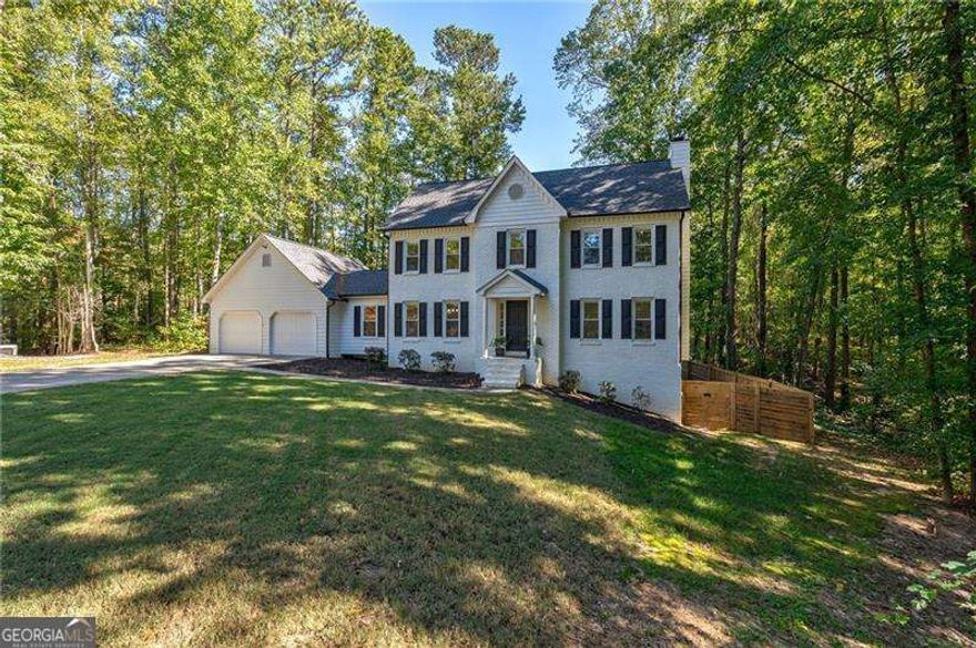 Come see the best of both worlds with this stunning two-story traditional home featuring a modern renovation! With hardwood floors throughout the entire home, the open kitchen consisting of walk-in pantry, stainless steel appliances and eat-in breakfast room flows into the spacious living room, offering a view of the private fenced-in backyard and deck perfect for entertaining. A perfect main-level office for added convenience is off of the kitchen. Upstairs, you'll find three bedrooms, including a spacious primary suite with a luxurious spa-like bathroom. The fully finished basement includes two versatile rooms ideal for guests, a gym, or whatever you envision. Additional upgrades consist of a new HVAC system, new water heater, whole-house water filtration system, and a newer roof. Situated in a peaceful cul-de-sac within a newly updated swim and tennis/pickleball community, this home is a must-see!