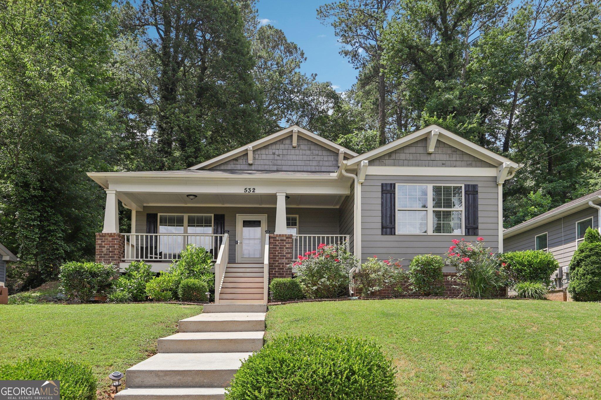 Welcome to 532 Lemon St NE-where charm meets convenience in the heart of Marietta! Located just a stone's throw from the vibrant Marietta Square, this beautifully maintained ranch home puts you steps away from local restaurants, antique shops, and year-round community events. Step onto the inviting rocking chair front porch and into an open-concept living space filled with natural light. The well-appointed kitchen features sleek granite countertops, a convenient breakfast bar, a new gas oven and cooktop, and stainless steel appliances-perfect for entertaining or quiet mornings at home. This low-maintenance home offers 3 spacious bedrooms and 2 baths, including a serene primary suite with a walk-in closet and a private ensuite bathroom. Enjoy peace of mind with a brand new HVAC system installed in 2024, ensuring year-round comfort and energy efficiency. Additional highlights include proximity to Kennestone Hospital, easy access to I-75, and everything downtown Marietta has to offer. Don't miss your chance to own this move-in ready gem in one of Marietta's most sought-after locations!