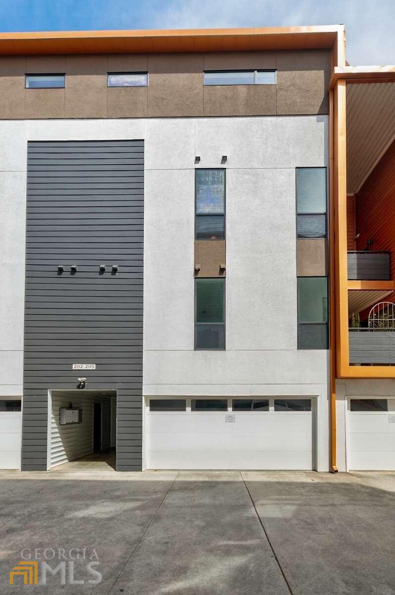Come enjoy Spring and the festival season in your new Inman Park home! This open concept, 1 bedroom, 1 bath loft style unit features concrete floors throughout, high ceilings, and is freshly updated. Bask in the bright and cheery interior due to the over-sized windows throughout the space. The open kitchen includes Stainless Steel appliances, stone counters, a wine rack and lots of storage. Head outside to your private patio to relax and entertain. The large bedroom easily accommodates a king sized suite with a spacious adjoining walk in closet for your needs. The highlight of the connected bath is the fully tiled European spa style shower and separate tub. All this in a secure building with designated garage parking for 2 vehicles, a dedicated personal storage room, community garden and green space. All this within a short walk to the Beltline, Krog Street Market, Edgewood Shopping District, numerous parks, restaurants and retail.