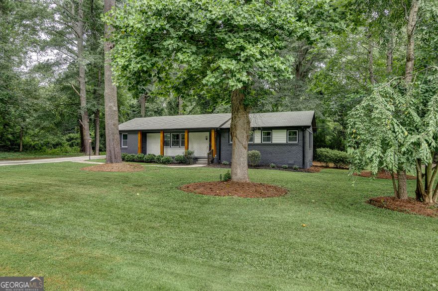 Charming Renovated Ranch Home! Location, location, location! Nestled in the heart of the beautiful Marietta community, this stunning ranch-style home is surrounded by trees and offers plenty of space for your family to thrive. The home has been thoughtfully renovated, featuring brand-new flooring and fresh interior and exterior paint throughout. The open concept layout is perfect for family gatherings and creating lasting memories. The spacious master suite includes a beautifully renovated bathroom, while one of the additional bedrooms has its own private bathroom, ideal for guests or family.  This home is ready for a wonderful family to make it their own. Do not miss out on this fantastic opportunity in a prime location! Contact us today for more details or to schedule a viewing.