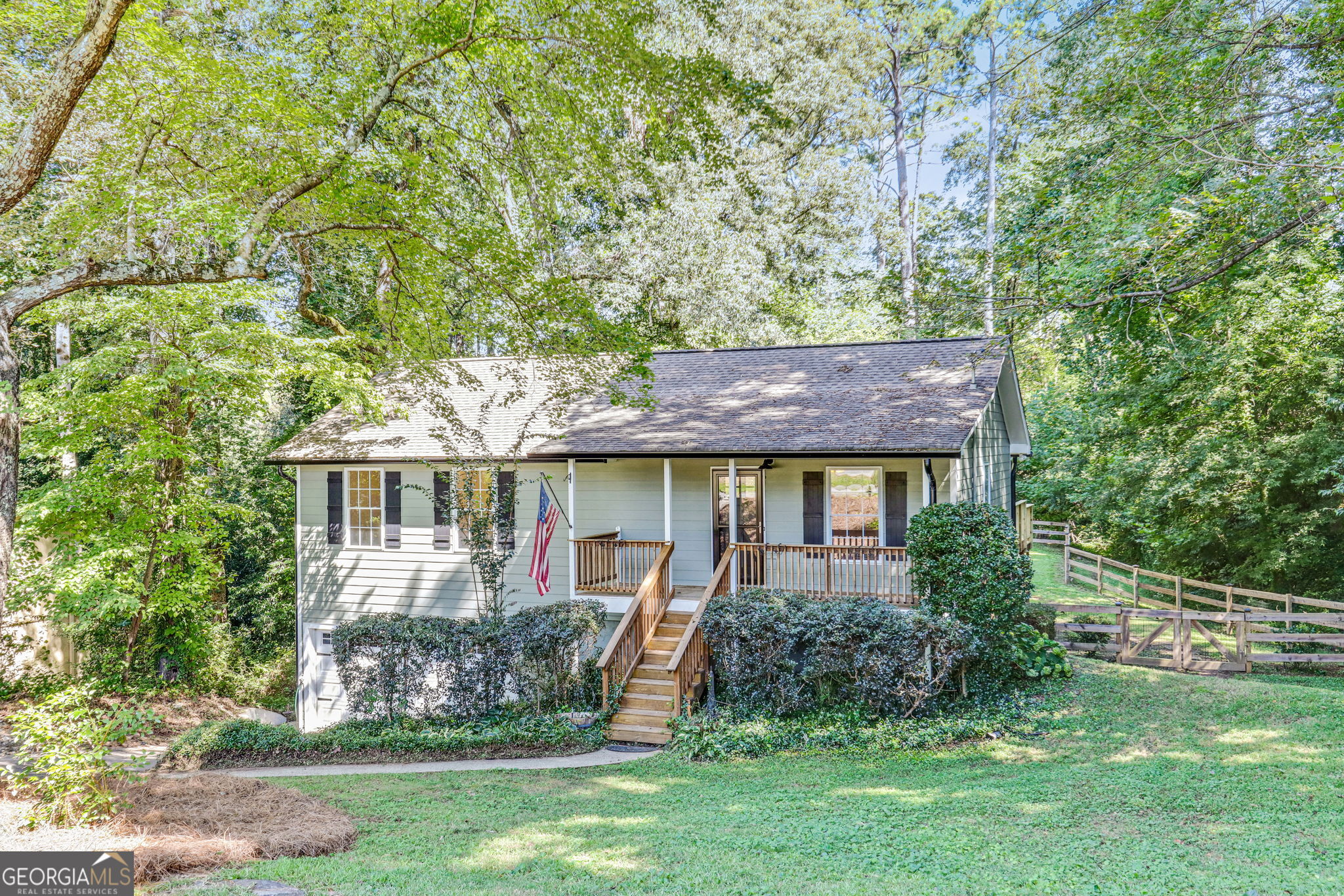 Located just minutes from the vibrant heart of downtown Woodstock, this charming split-level home offers the perfect blend of convenience and comfort. Set in a sought after Cherokee County school district, it's only a five-minute drive or a 1.5mile walk to shops, dining, and entertainment. Inside, the flexible floor plan shines with two primary bedroom options. The main floor features a spacious primary suite with hardwood flooring and fresh, neutral paint throughout, while the lower level offers a second suite ideal for multigenerational living, guests, or a private office. Step outside to discover your own private oasis: a brand new back deck that invites al fresco dining and relaxation, overlooking a fully fenced yard perfect for pets, play, or gardening. With move in ready updates and thoughtful touches throughout, this home combines modern comfort with a prime location your ideal retreat just minutes from everything Woodstock has to offer. Also offering a 1-0 temporary lender buy down when using our preferred lender, please reach out to the listing agent, Stephanie Bernhardt, for more details.