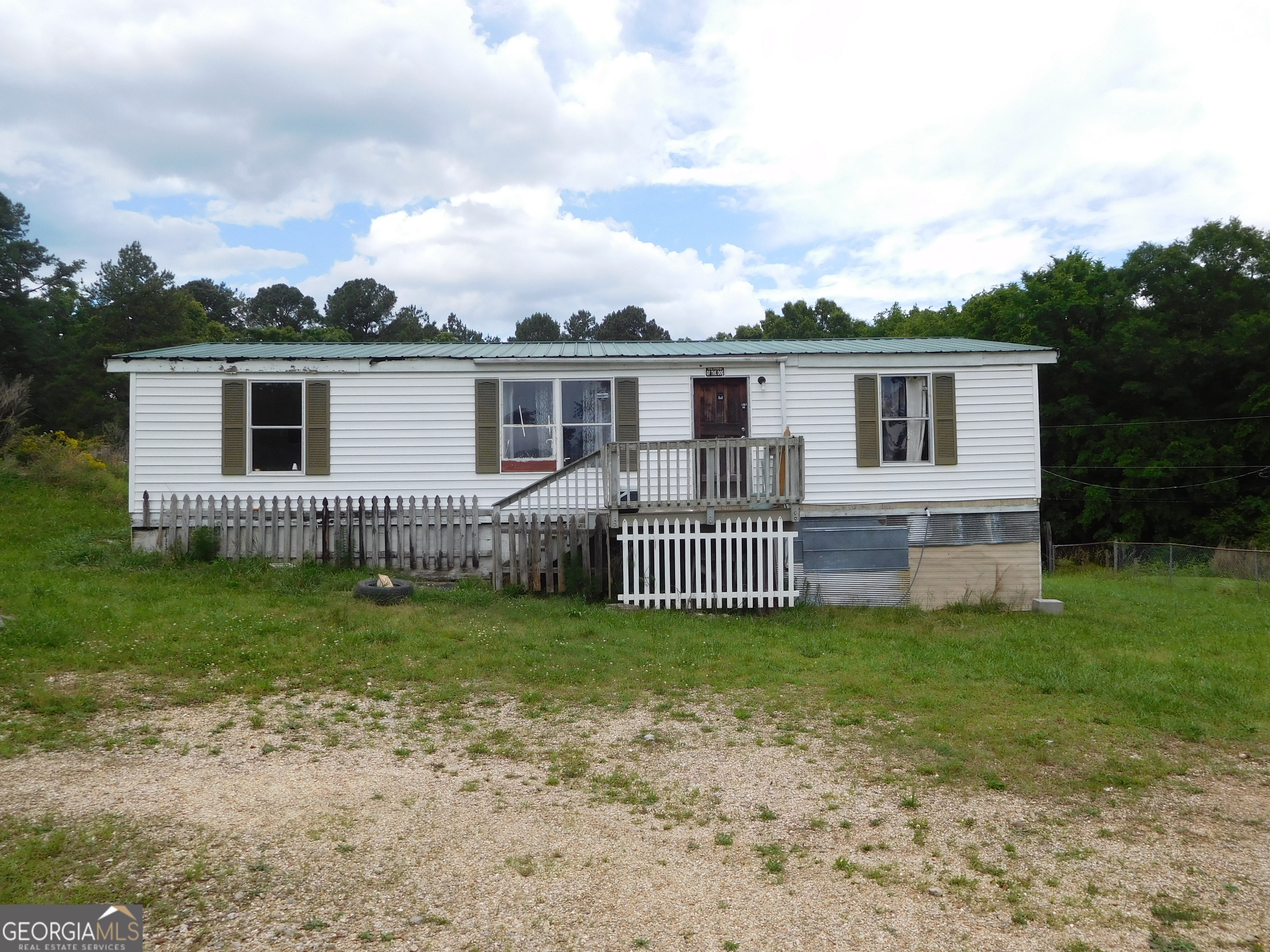 Great property investment in the Rome area! Three bedroom and two bath mobile home nestled on 0.85 acres. The exterior boasts a large lot with a storm shelter on the property. Don't hesitate, schedule your own private showing today!
