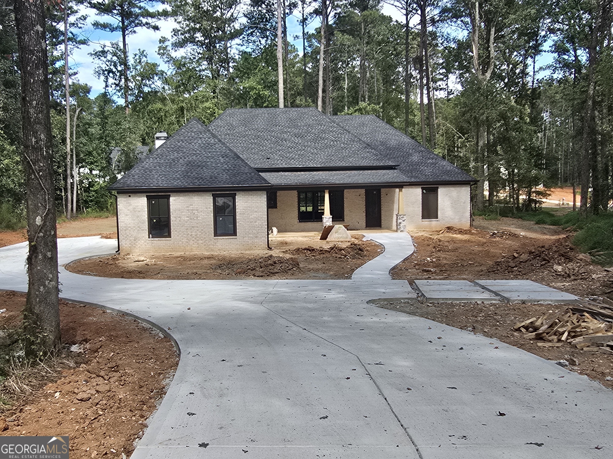 NEW CONSTRUCTION Custom 4Bdrm, 3.5Bath RANCH your Custom Dream Home. The Primary Bedroom with two additional guest bedrooms on the main level, plus an additional guest Bedroom and Full Bath upstairs. Buyer to select finishes. Approx. 3,201sqft in the most Fantastic Location off Fischer Rd, Sharpsburg and situated on 3 Acres, just minutes from shopping, dining and entertainment and close to I-85. Open, Spacious Plan with Gourmet Kitchen, Large Island, Family and Keeping Room each with a cozy fireplace. The perfect blend of luxury, comfort and convenience. NO HOA. Custom Millwork, covered large outdoor patio, three car garage in the highly desirable Blake Bass Middle and Northgate High School District.
