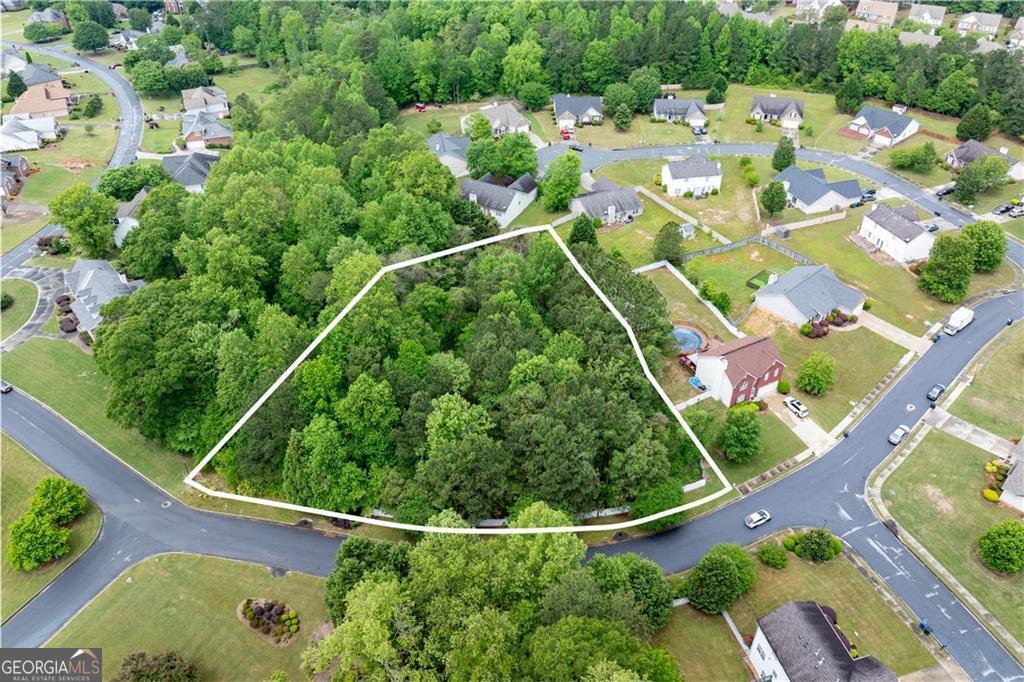 This 1.18 acres corner lot in a quiet and nice neighborhood ready to build, will not last. Bring your offer, start Building and be part of this community surrounded with $350,000 to $500,000 and plus homes.