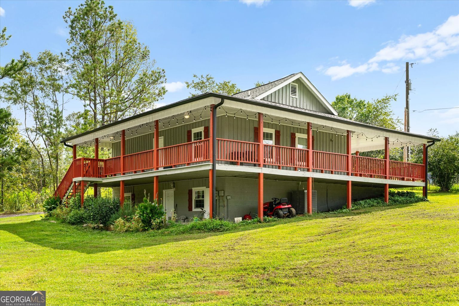 Discover the perfect blend of space, flexibility, and charm in this 4-bedroom, 2.5-bath home on 1 acre with a newer roof and HVAC system (both just 5 years old). The main level features a spacious primary suite, inviting living spaces, and an updated kitchen. The finished downstairs offers incredible potential as a MIL suite or rental unit, with 3 bedrooms, a kitchen, a full bath, and its own laundry-ideal for generating income and offsetting your mortgage. Enjoy the expansive, fully fenced lot from the wraparound porch, perfect for relaxing or entertaining. With updates throughout, a second kitchen, and versatile layout options, this property is a rare find in Dalton.