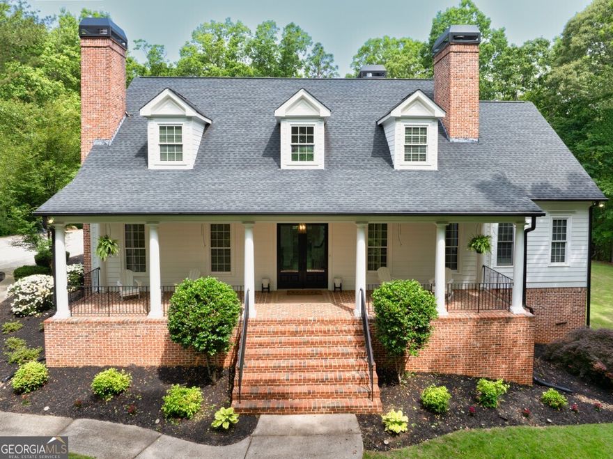 Welcome to 5588 Rhododendron Trail a beautifully upgraded retreat in the heart of Douglasville. This meticulously maintained home offers the perfect blend of comfort, style, and thoughtful upgrades from top to bottom. Set on a beautifully landscaped 5 acre lot, the property features a new ridge-vented roof (2019), a LeafGuard gutter system, and a French drainage system in both the front and back yards for worry-free living. Step inside to stunning hardwood floors that flow throughout the main level, leading you into a completely remodeled kitchen with custom cabinetry, premium countertops, new appliances, upgraded pantry storage, and a sleek hood ventilation system. Designer sinks, faucets, and hardware complete the look. The open living space includes a reimagined wood and gas fireplace, modern wall and ceiling lighting, new windows and fresh interior paint on all walls and trim. The luxurious primary suite boasts a fully renovated master bath with spa-quality finishes and upgraded Toto toilets also installed throughout the home. The basement has been transformed with new flooring and a clean, modern feel, offering flexible space for a home office, gym, or media room. Outside, enjoy a new deck (2021), refreshed exterior paint, and exterior lighting with ceiling fans for comfortable evenings outdoors. The stamped concrete walkway and pool surround have been reglazed for a crisp, updated look, and the sand filter system ensures your pool stays sparkling. A new mailman drive pad, small retaining wall, and significant tree removal elevate the curb appeal and function of the property. This private retreat has no HOA.