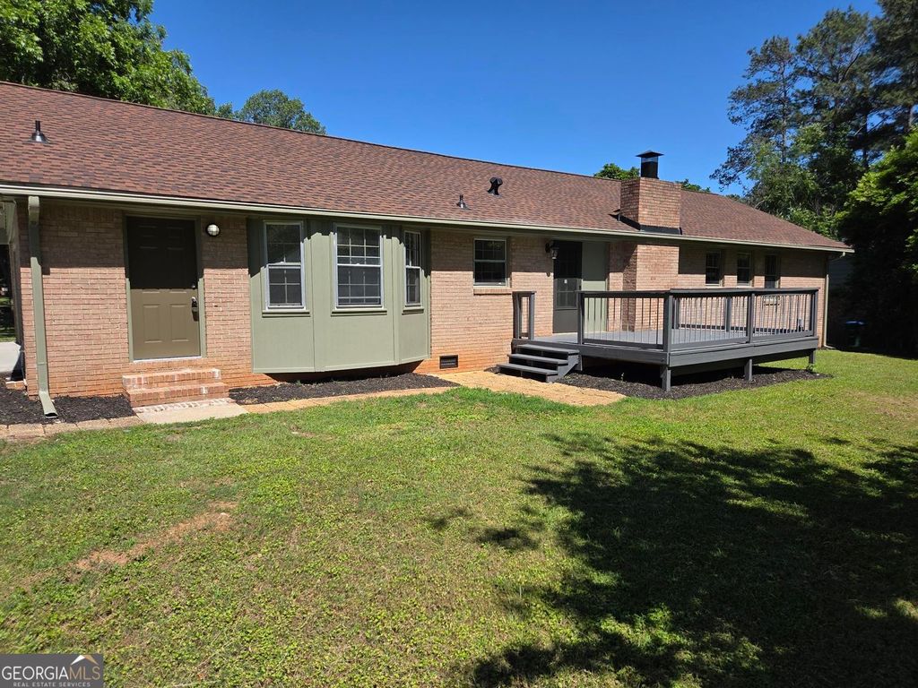 Photo of 1697 Fremont Drive SW, Stone Mountain, GA 30087 (MLS # 10765459)