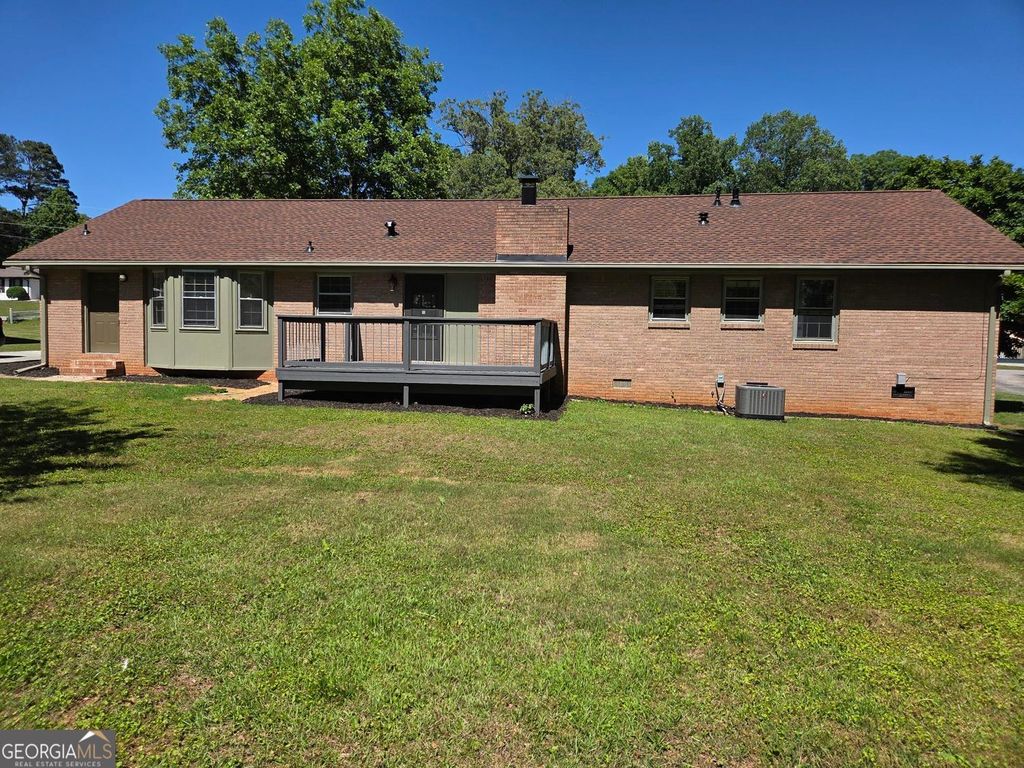 Photo of 1697 Fremont Drive SW, Stone Mountain, GA 30087 (MLS # 10765459)