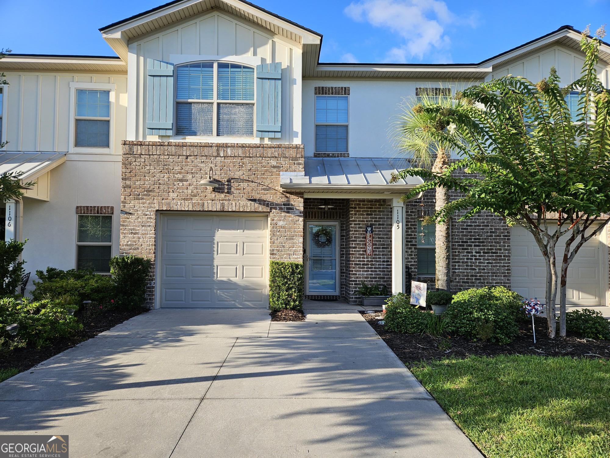 Experience luxury living in this stunning townhome on Saint Simon's Island, Georgia. This spacious townhome features 3 bedrooms, 2.5 bathrooms, with a home office. The primary suite is located on the main floor. The primary bathroom features a tiled walk-in shower with a glass enclosure and bench. a separate toilet closet, with dual vanity sink, and a spacious master walk-in closet. Off the primary suite is double doors leading to the patio. This townhome features all new carpet. Additionally, downstairs you have the living room, dining room, home office, half bath, laundry room and kitchen. The kitchen is equipped with all new stainless-steel appliances. While additional living space upstairs offers 2 bedrooms, full bathroom, living area or guest quarters. This townhome has a beautiful lake and a welcoming community pool. Don't miss the chance to make this exceptional property yours. Only minutes away from shopping, entertainment, and restaurants.