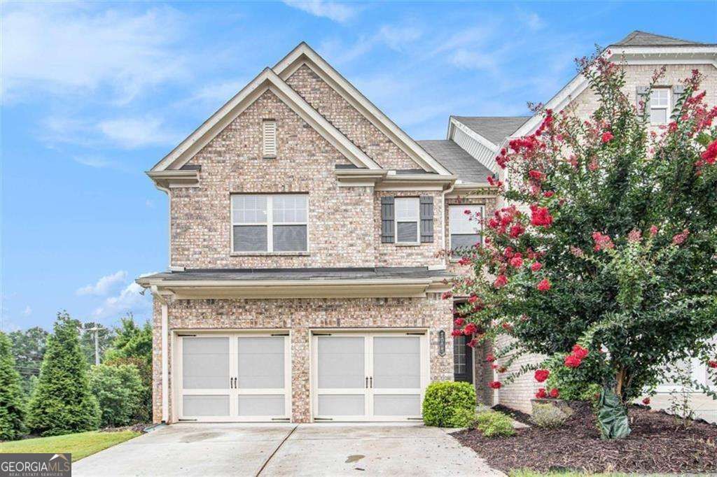 Photo of 7065 Post Park Way, Cumming, GA 30040 (MLS # 10656672)