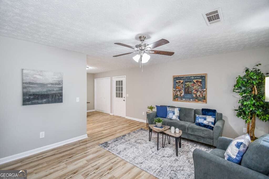 Photo of 110 E Country Woods Drive, Covington, GA 30016 (MLS # 10824579)