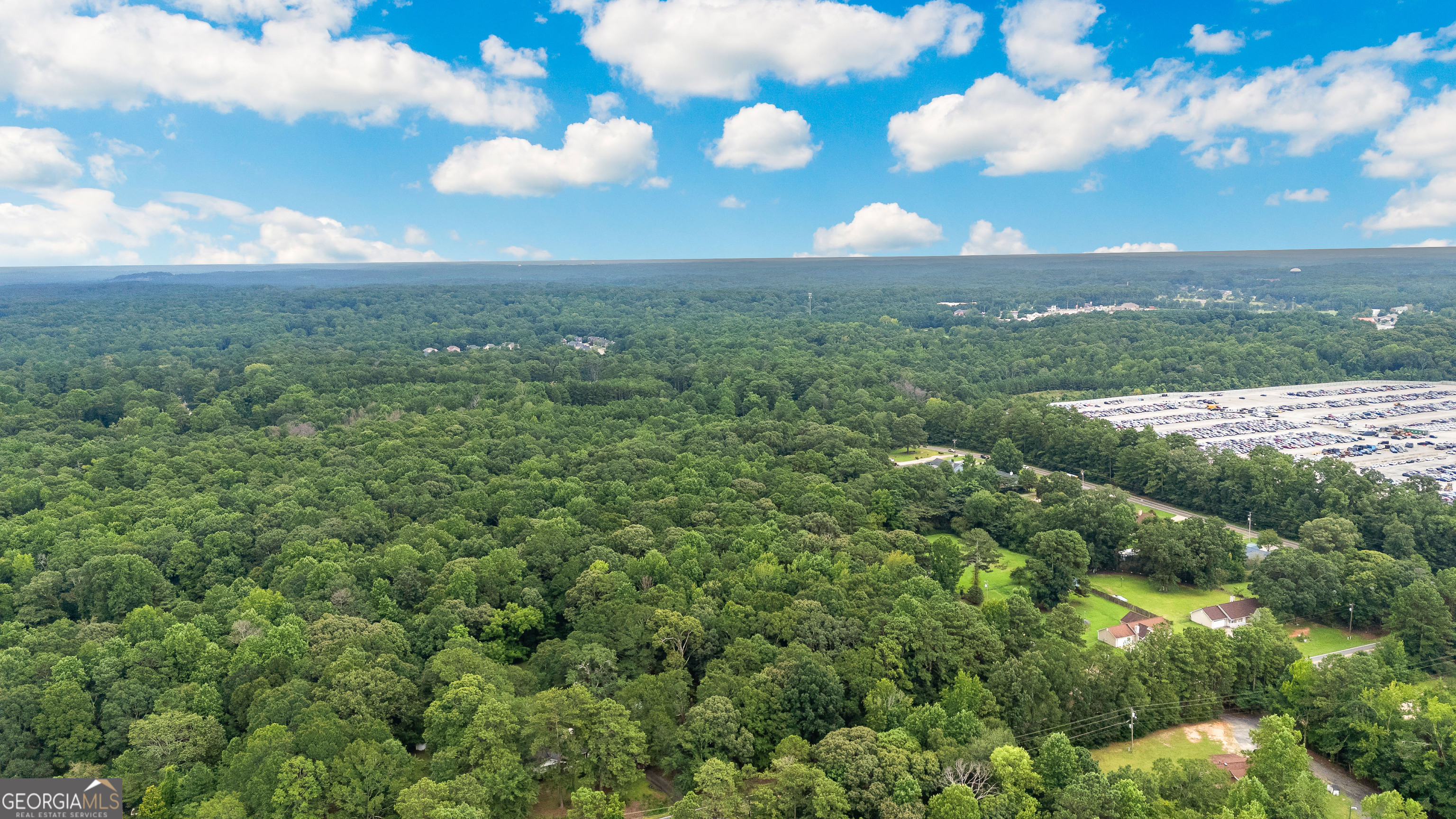 Build your dream home on this stunning 9.38-acre property featuring a perfect mix of hardwoods and pines. Enjoy a beautiful creek along the back of the property, adding to the peaceful, private setting. Flat and buildable with a recent perc test completed-ready for your vision to become reality.