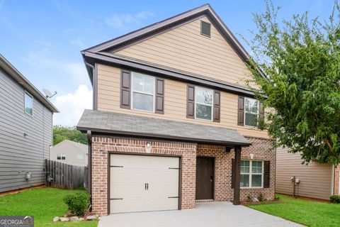 Photo of 5907 Grande River Road, Atlanta, GA 30349 (MLS # 10448193)