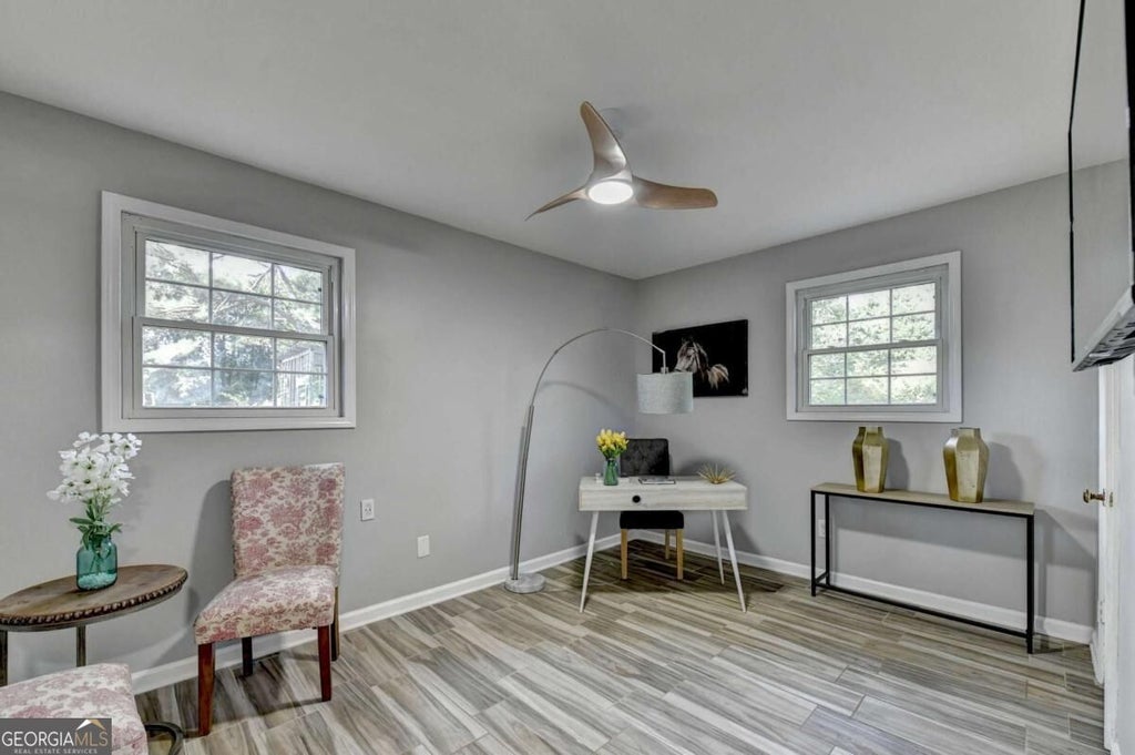 Photo of 4391 Bryant Drive SW, Lilburn, GA 30047 (MLS # 10849986)