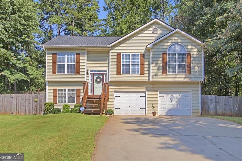 This spacious 4-bedroom, 2.5-bath home sits on a generous 0.78-acre lot, offering plenty of room for both indoor and outdoor living. With its inviting layout, comfortable living spaces, and ample natural light, this property is ideal for family living or entertaining. Don't miss the opportunity to make this beautiful home yours!