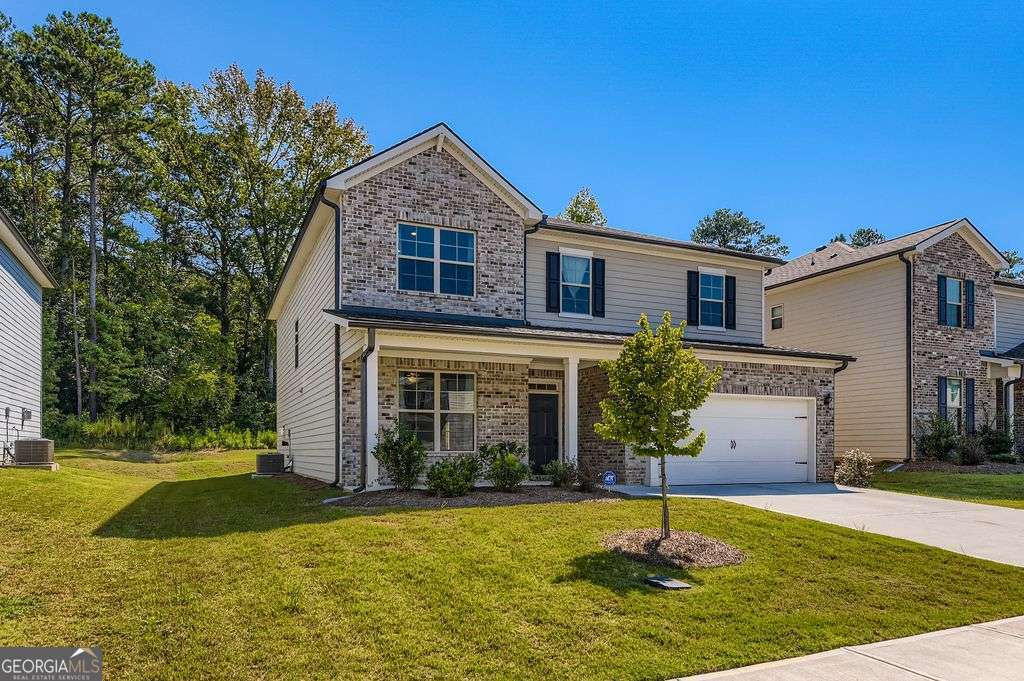I am excited to share details about a fantastic property: 325 Caledonia Court. Built in 2022, this home is nestled in Wilksmoor Woods, an exceptional "golf cart" community. The main level features a full flex use room with full bathroom, perfect for guests bedroom or a dedicated home office. The bright and spacious kitchen includes an island with a two-chair breakfast bar, stainless steel appliances (including a separate freezer with auto-seal), and a large walk in pantry. It seamlessly opens into the family room, which includes a cozy fireplace and an open-concept living space. Upstairs, you will find an oversized loft, a convenient laundry room, and a spacious owner's suite. The owner's suite is a true retreat, offering a spa-like bathroom and an oversized walk-in closet. Outside, a covered patio overlooks a private, gently sloped backyard, ideal for outdoor entertaining. The two-car garage is also designed to accommodate a small golf cart. This energy-efficient home is conveniently located near top-rated schools, parks, and shopping, with easy access to Highway 85. Residents of Wilksmoor Woods enjoy excellent neighborhood amenities, including a pool, playground, and clubhouse. The community's connection to Peachtree City's renowned 100+ miles of golf cart paths, along with its proximity to The Avenue Shopping Center, Line Creek Nature Area, and The Fred Amphitheater, truly makes this a perfect live, work, and play environment. Additional benefits include a termite bond, a Home Warranty, and a 10-year new construction warranty. Top-brand washer/dryer and the auto-sealing freezer are included. Furthermore, an existing Homestead Exemption offers tax relief, and immediate equity is expected compared to current comparable properties.