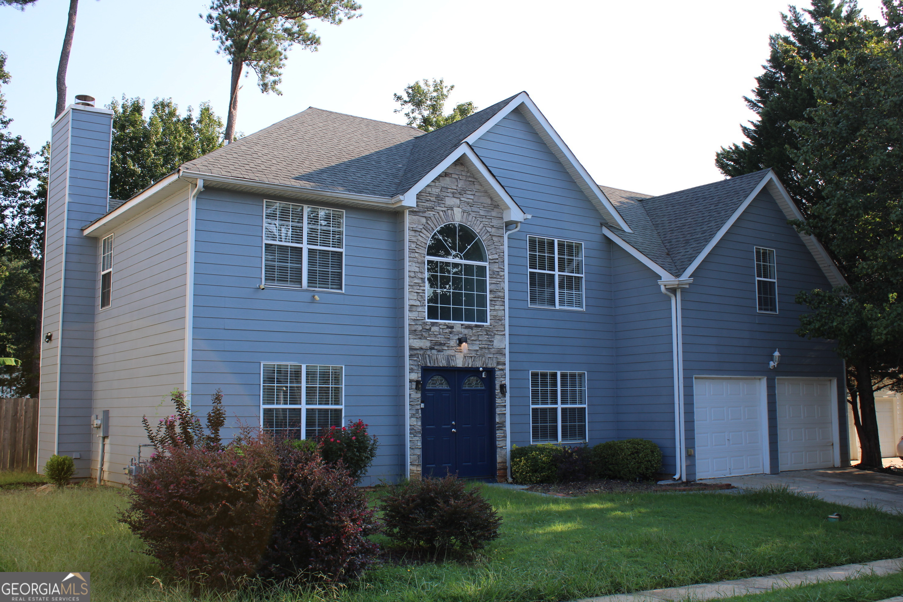 Amazing Home! Spacious 4 Bedroom, 3.5 Bath Home in desirable Cheshire Estates Community - NO HOA! Move in Ready with a 2 story Foyer, Open Floorplan, Eat-in Kitchen, Formal Dining Room, Living Room and Great Room with Fireplace. Home sits on a level lot with a Large backyard perfect for entertaining. Hugh Master Suite with Vaulted Ceiling that comfortably fits a King Set. Master bathroom features a Garden tub, Separate Shower, and Dual Vanities. Plenty of Closet space! Located close to Stonecrest Mall, Stone Mountain Park and Redan Park.