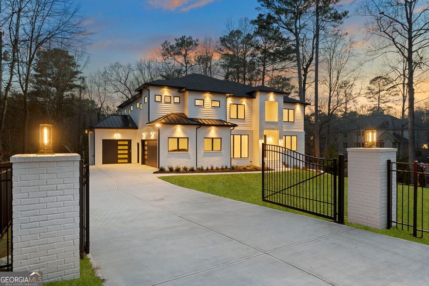 Solid-built gated estate on over half an acre, conveniently located near shopping, restaurants, downtown Roswell, and major highways (400 & 285). This newly custom-built home offers 6 bedrooms, 6 full baths, 2 half baths, and a 3-car garage, making it ideal for multi-generational living. Every bedroom has a private bath with a frameless glass walk-in shower, walk-in closet, and a separate thermostat, ensuring comfort and privacy for all.    The open floor plan boasts a two-story foyer, 12-foot ceiling in the great room, and abundant natural light from large custom windows. Stackable sliding doors seamlessly connect indoor and outdoor spaces, leading to a spacious covered back deck with Trex flooring and metal handrails.    The gourmet kitchen showcases an oversized island with waterfall quartz countertops, high-end Thermador appliances, custom double-stacked cabinetry, and a walk-in pantry. Hardwood floors throughout create a clean, allergen-free environment.    A main-level guest suite is perfect for in-laws. Upstairs, you'll find 4 bedrooms with tray ceilings, 4 baths, and a large media room. The owner's suite features a luxurious bathroom with a floor-to-ceiling glass super shower, dual water closets, and spacious his-and-hers closets with built-in shelves.    The finished daylight terrace level includes a second full kitchen, ideal for an in-law or teen suite, a movie theater, and a bedroom with an ensuite bath. The private fenced backyard offers ample space for a pool, outdoor kitchen, and more.    Spray foam insulation and tankless water heater enhance energy efficiency and help reduce utility bills. This property is part of the Willow Point subdivision, which offers a swimming pool, tennis courts, playground, basketball court, and pavilion. With a long driveway providing ample guest parking, this move-in-ready, North-facing home delivers exceptional value!