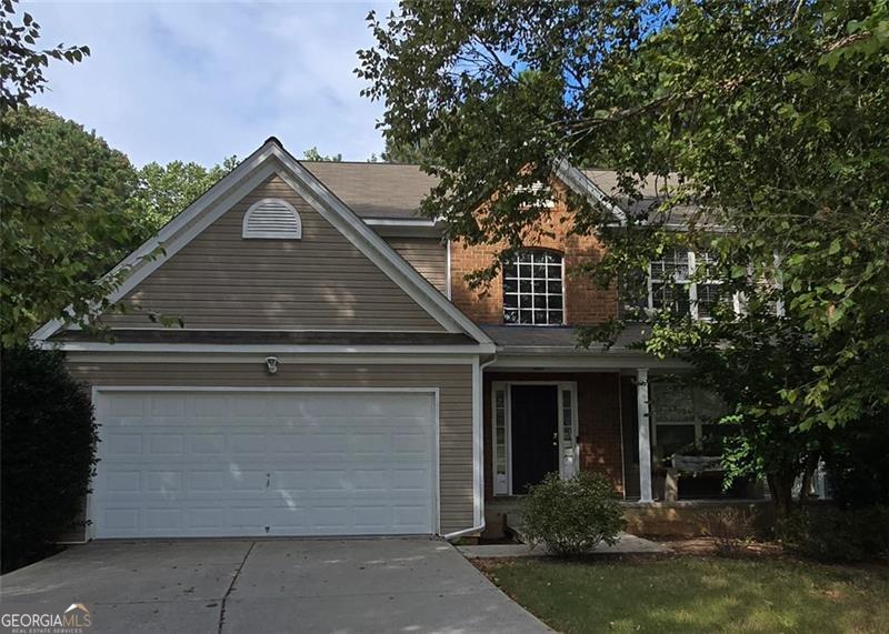 Welcome Home! This beautiful home offers 4 bedrooms, 3.5 bathrooms located in the wonderful neighborhood of Haynes Crossing in a well-established community of Grayson. Providing ample space for enjoyable living. Hardwood floors throughout the home, a separate dining room and family open to the kitchen area. Kitchen stainless steel appliances and wood countertops. Upstairs features a large primary owner's suite with a spacious bathroom showcasing double vanities, a walk-in shower, large garden tub, and a walk-in closet, two secondary bedrooms and two a full bathroom. Finished basement, includes a private bedroom, bathroom, living area with an exterior entry. Award winning Gwinnett County School, conveniently located near grocery stores, local restaurants, community parks, and shopping. This is a great opportunity to make this your dream home! This won't last long on the market.