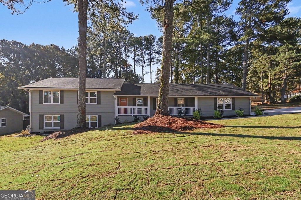 Photo of 7535 Lowilla Lane, Lithonia, GA 30058 (MLS # 10881465)