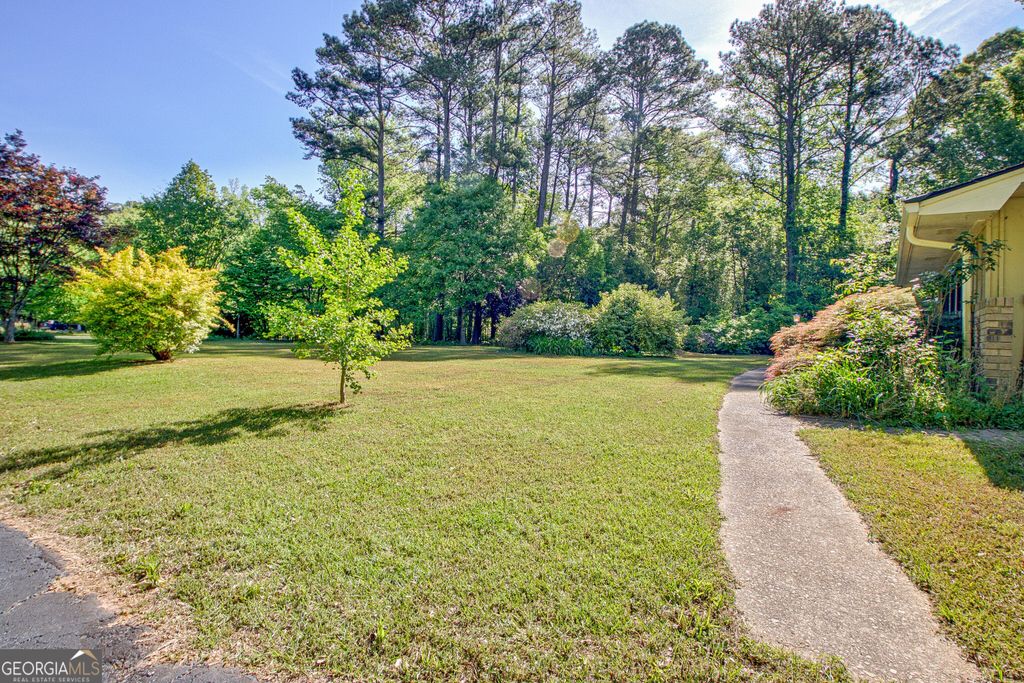 Photo of 115 Hickory Place, Fayetteville, GA 30214 (MLS # 10736016)