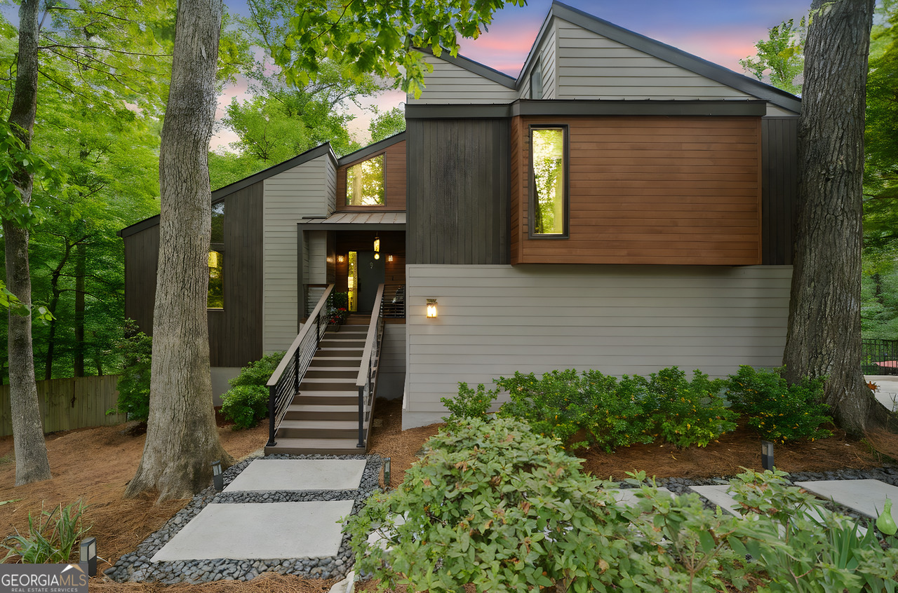 Welcome to one of Willow PointCOs most distinctive and architecturally striking homesCocustom designed and meticulously renovated to blend modern contemporary design with everyday livability. Nestled at the end of a private cul-de-sac in one of East CobbCOs most coveted swim/tennis communities, this one-of-a-kind residence is a true showstopper. Every inch of this home has been thoughtfully curated, with no expense spared. From the brand-new HardiePlank siding and triple-paned energy-efficient sash windows to the roof (less than 2 years old), the exterior is as refined as it is durable. Multiple expansive Trex decks provide seamless indoor-outdoor living, with views of a lush, professionally landscaped backyard, fenced for privacy and centered around a serene creek and glistening poolCoyour own private resort. Inside, bold architectural elements take center stage: a dramatic sunken conversation pit with a statement double-sided fireplace, soaring ceilings, sleek finishes, and a primary suite that stuns with its own spiral staircaseCoa truly unexpected and artful design feature. Set within the award-winning trifecta of schoolsCoMount Bethel Elementary, Dickerson Middle, and Walton HighCothis home offers not only unparalleled style, but also unmatched educational opportunities. For the discerning buyer who appreciates originality, craftsmanship, and a lifestyle of elevated livingCothis home is more than just a property. ItCOs a masterpiece.