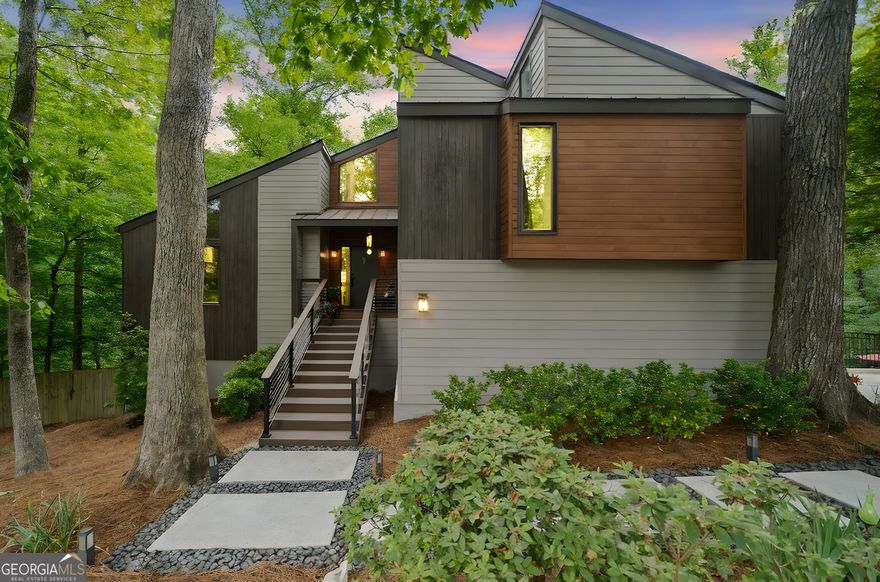 Welcome to one of Willow PointCOs most distinctive and architecturally striking homesCocustom designed and meticulously renovated to blend modern contemporary design with everyday livability. Nestled at the end of a private cul-de-sac in one of East CobbCOs most coveted swim/tennis communities, this one-of-a-kind residence is a true showstopper.  Every inch of this home has been thoughtfully curated, with no expense spared. From the brand-new HardiePlank siding and triple-paned energy-efficient sash windows to the roof (less than 2 years old), the exterior is as refined as it is durable. Multiple expansive Trex decks provide seamless indoor-outdoor living, with views of a lush, professionally landscaped backyard, fenced for privacy and centered around a serene creek and glistening poolCoyour own private resort.  Inside, bold architectural elements take center stage: a dramatic sunken conversation pit with a statement double-sided fireplace, soaring ceilings, sleek finishes, and a primary suite that stuns with its own spiral staircaseCoa truly unexpected and artful design feature.  Set within the award-winning trifecta of schoolsCoMount Bethel Elementary, Dickerson Middle, and Walton HighCothis home offers not only unparalleled style, but also unmatched educational opportunities.  For the discerning buyer who appreciates originality, craftsmanship, and a lifestyle of elevated livingCothis home is more than just a property. ItCOs a masterpiece.