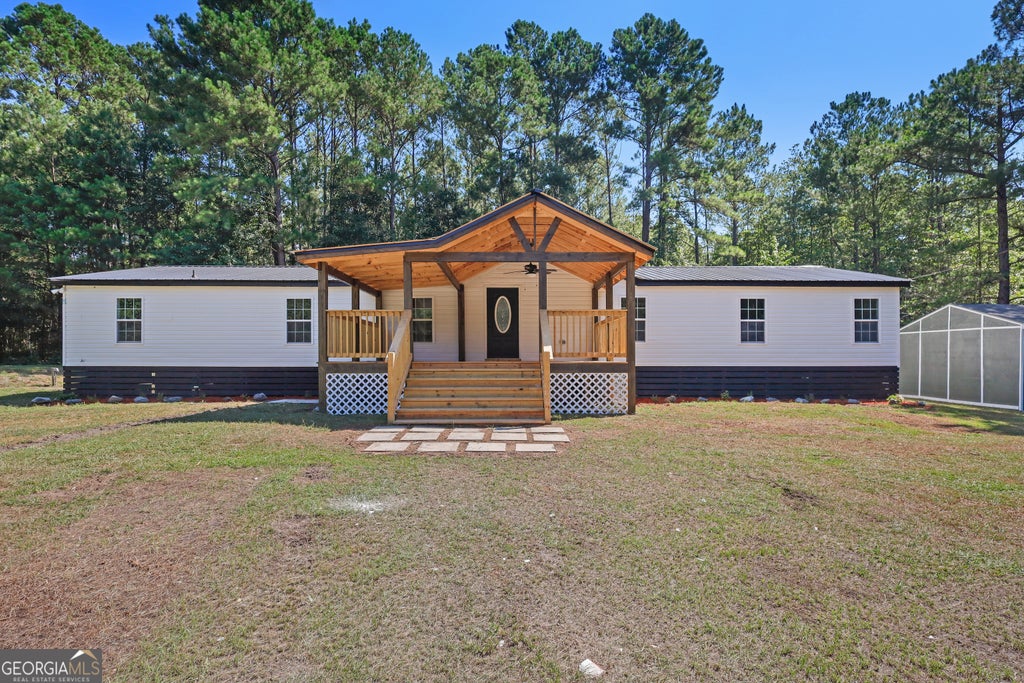 Photo of 2458 Cecil Nobles Highway, Ludowici, GA 31316 (MLS # 10808536)