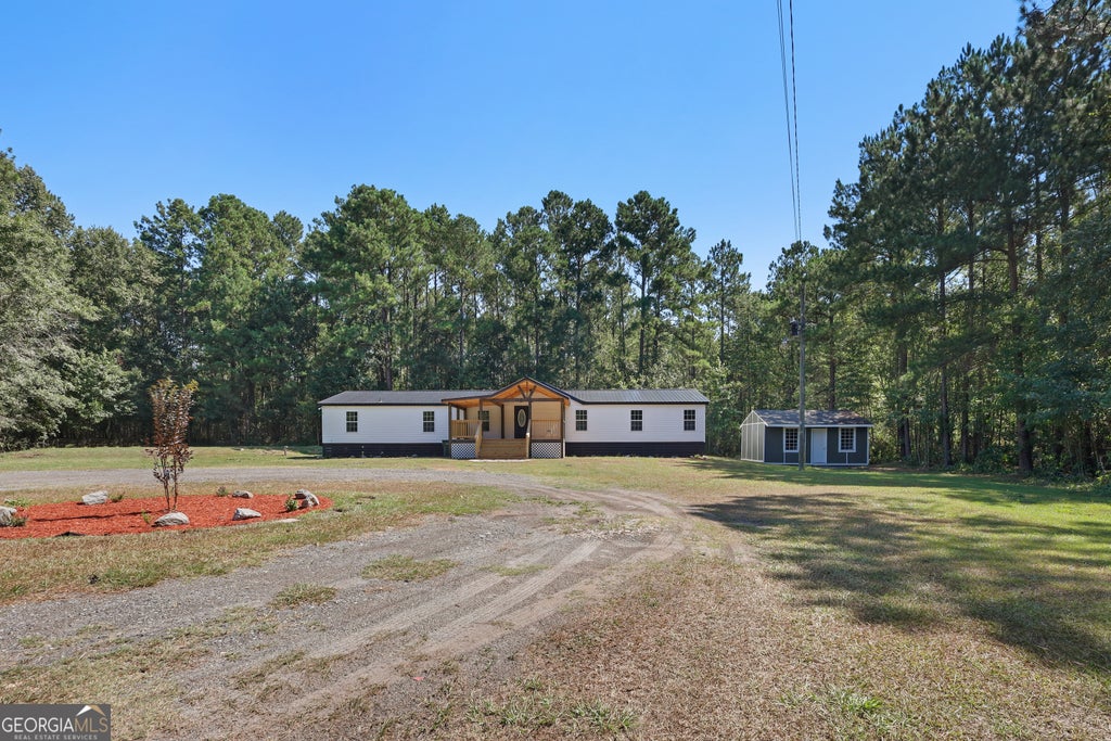 Photo of 2458 Cecil Nobles Highway, Ludowici, GA 31316 (MLS # 10808536)