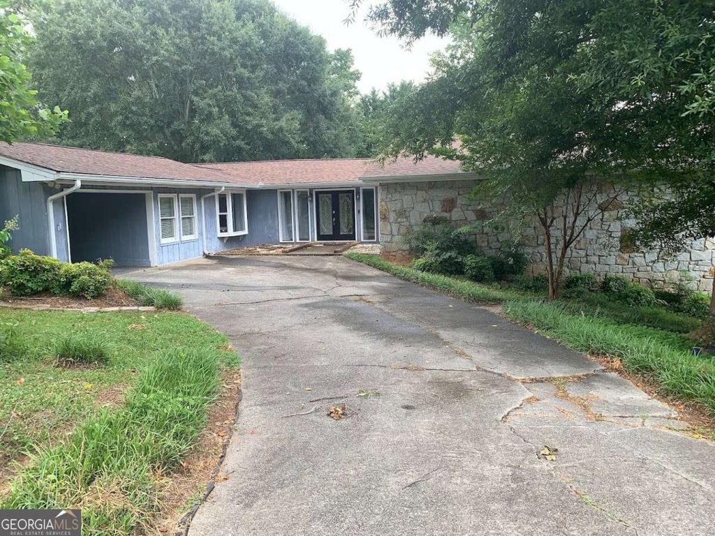 Photo of 402 Emily Drive SW, Lilburn, GA 30047 (MLS # 10804918)