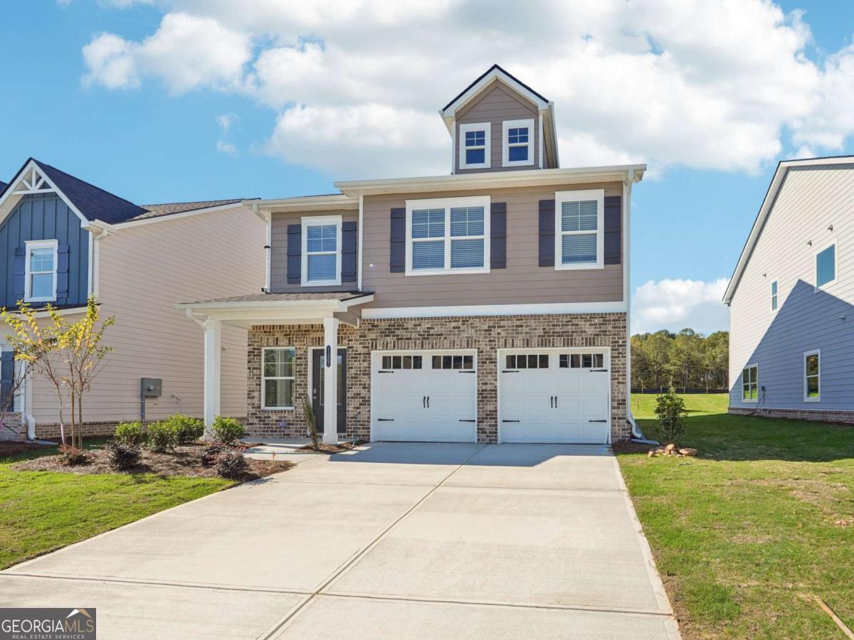 The Fairfield at Neely Farm Take advantage of $20,000 in Builder Incentives (zero closing costs with approved lenders) and ask about our limited-time 100% Financing Program - USDA eligible! This 5-bedroom, 3-bathroom home features a spacious foyer with a double-door coat closet, leading to a formal dining area. The open-concept layout includes a modern galley-style kitchen with granite countertops, stainless steel appliances, a large island, ample cabinet space, and a pantry. The kitchen opens to the breakfast area and family room with a fireplace. Upstairs offers a central loft surrounded by secondary bedrooms, a full hall bath with dual vanity, and a laundry room. The Owner's Suite includes two walk-in closets and a bathroom with a separate tiled shower and tub. Additional features include energy-efficient LED lighting and a 2-car garage. Photos are representative of the floor plan and may not depict the actual home.